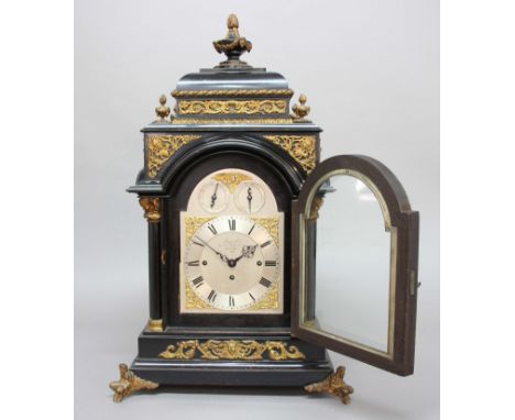 VICTORIAN EBONISED AND GILT METAL MOUNTED BRACKET CLOCK AND BRACKET, the silvered dial with 7 1/4" chapter ring and gilt span