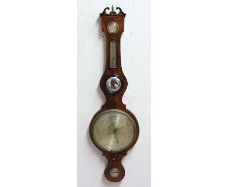 REGENCY MAHOGANY AND LINE INLAID WHEEL BAROMETER, the hygrometer above a thermometer, mirror and silvered main dial, the spir