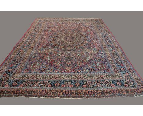 BIRJAND CARPET, Khorasan, the raspberry field with central medallion framed by spandrels and multiple borders, 380cm x 265cm