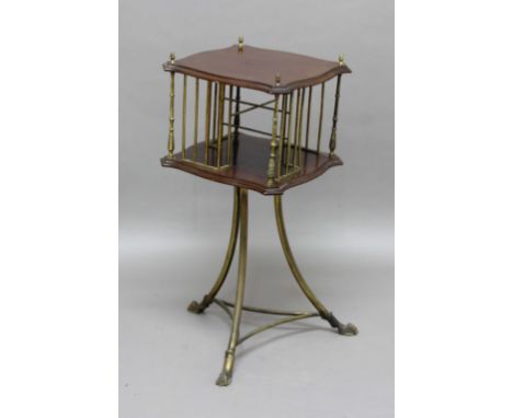 EDWARDIAN MAHOGANY AND BRASS REVOLVING BOOK TABLE, the shaped square top above four brass sections and on a splayed, tripod b