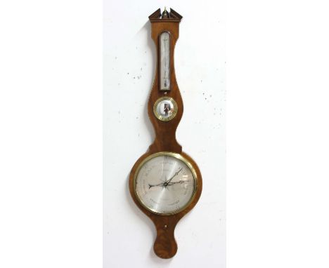MAHOGANY WHEEL BAROMETER, with thermometer and mirror above an 11" silvered dial inscribed Charles Somalvico, London, height 