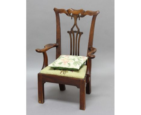 CHIPPENDALE STYLE CHILD'S MAHOGANY OPEN ARMCHAIR, with pierced splat, scrolling arms and drop-in seat, height 64cm