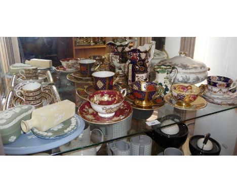 Five various cabinet cups and saucers, inc. Wedgwood, Coverswall, etc., a Masons "Double Landscape" jug, etc. (one shelf)