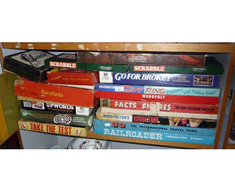 Large quantity of vintage board games including Take the Test, Go Railroader, Booby Trap, etc (16 on one shelf) 