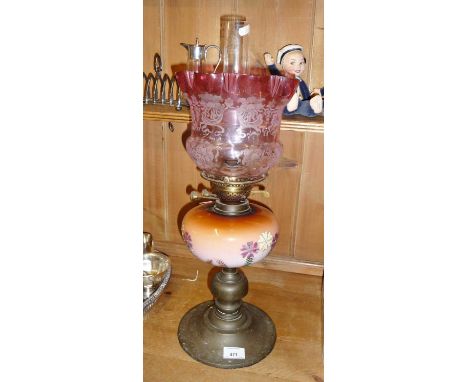 Edwardian oil burner lamp with pink etched Cranberry glass shade over a handpainted peach opaline glass reservoir. Approx 58c