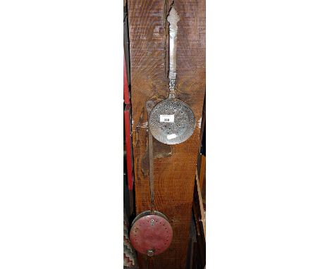 Persian copper reticulated strainer spoon and a copper chestnut roaster