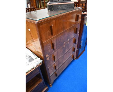A vintage bedroom chest of five drawers