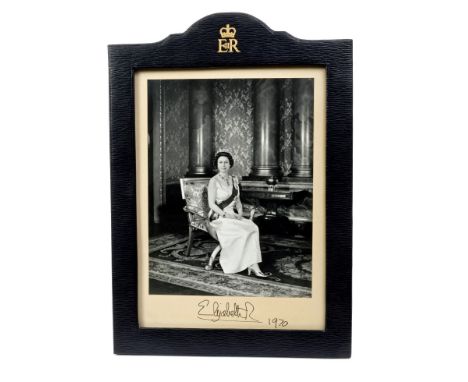 HM Queen Elizabeth II, signed presentation portrait photograph of Her Majesty seated, wearing an evening gown, diamond tiara,