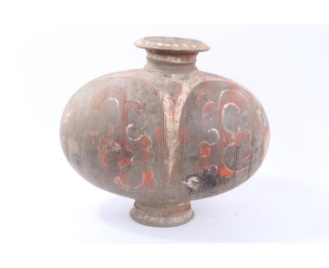 Ancient Chinese pottery ovoid-shaped vessel with traces of red and white painted scroll decoration, on circular foot, 32cm hi
