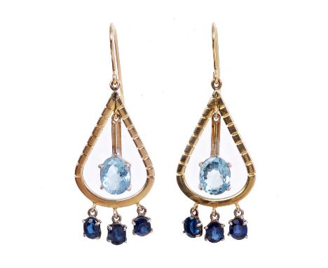 Pair aquamarine and sapphire earrings each suspending an oval mixed cut aquamarine pendant drop within a pear shape gold fram
