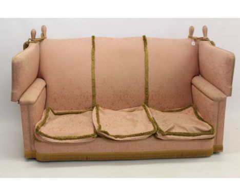 19th century style Knole sofa, typical drop end square form raised on castors, salmon pink upholstery