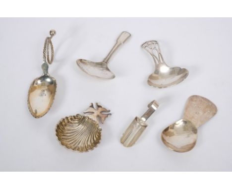 A George III silver caddy spoon with fiddle and thread pattern handle (Birmingham 1790), together with five other early 20th 