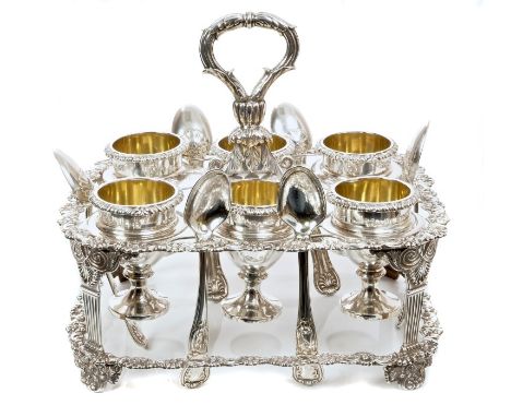 Fine quality George IV silver egg cup stand of rectangular form, with stylised shell and leaf decoration, four classical-styl