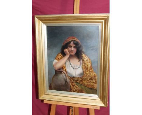 Late 19th / early 20th century Continental School oil on board - portrait of a gypsy girl leaning on a ewer, in glazed gilt f
