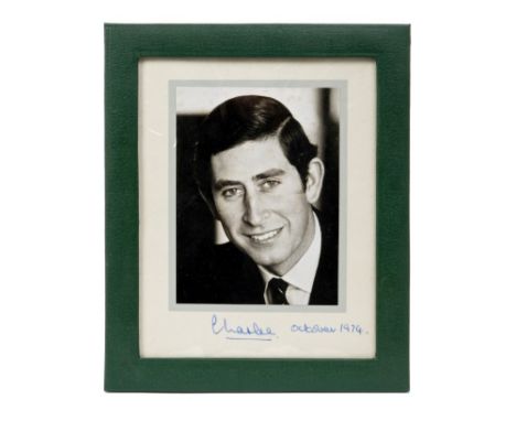 HRH Prince Charles The Prince of Wales - signed presentation portrait photograph of The Prince smiling, signed in ink on moun
