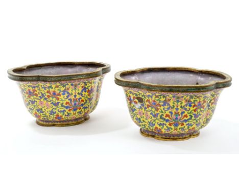 Pair of 19th century Chinese cloisonné quatrefoil-form jardinières, each with scrolling lotus flower ornament, on Imperial ye