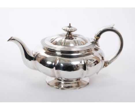 George IV silver teapot of melon form, with fluted panels and reeded border, silver loop handle with ivory insulators and hin