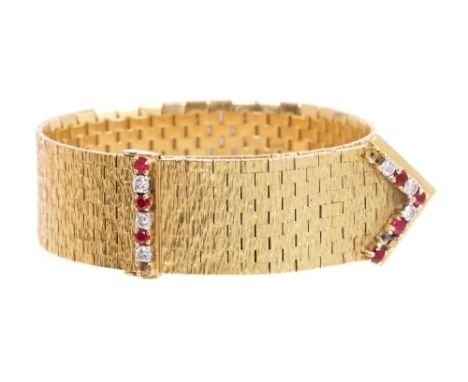 1960s 18ct gold ruby and diamond bracelet, the textured Milanese gold articulated band with a stylised belt design, the termi