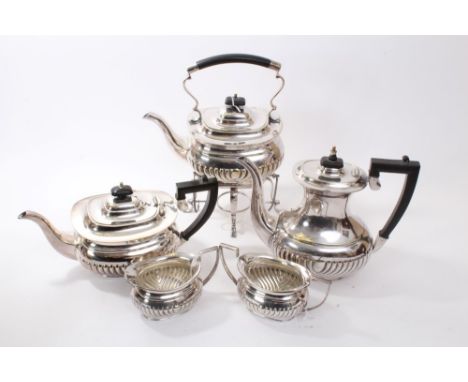 Early 20th century five piece silver plated tea and coffee set - comprising spirit kettle of half-fluted form, scroll handle 