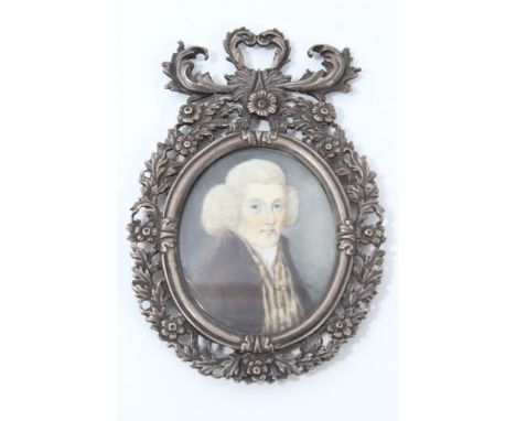 18th century Northern European portrait miniature, the oval bust-length portrait of a gentleman in red coat and striped waist