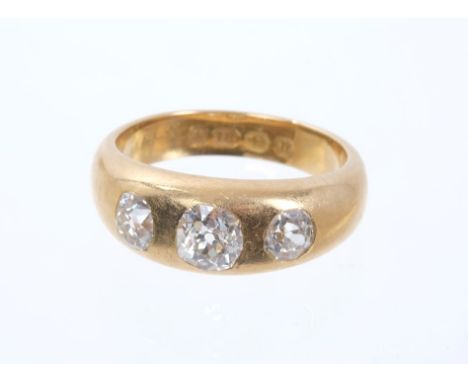 Victorian diamond gypsy ring with three old cut diamonds estimated to weigh approximately 1.00ct in a heavy 18ct gold rub ove