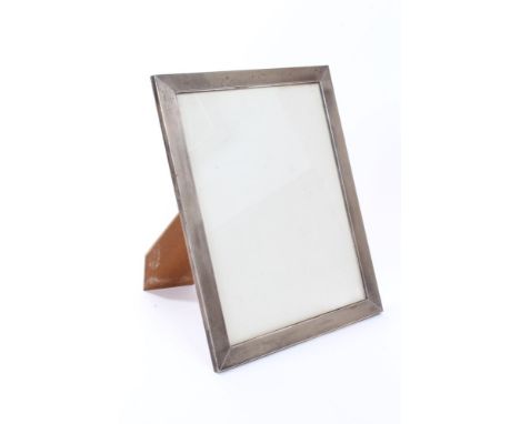 Early 20th century Continental silver photograph frame of rectangular form, with engine-turned decoration and easel back (sta