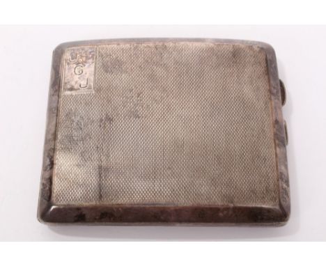 1930s silver cigarette case of shaped form, with engine-turned decoration and engraved initials (Birmingham 1930), maker - S.