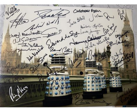 Doctor Who 16x12 inch Tardis photo signed by over THIRTY actors who have played various characters in the series over the yea