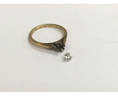 An 18ct gold ring with a loose diamond, approx 2.1g and approx size K.