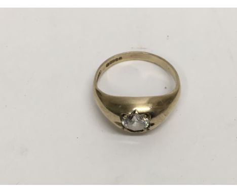 A 9ct gold gypsy ring set with a white sapphire, approx 2.7g and approx size R.