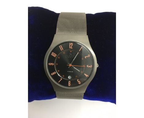A gent's Skagen Titanium wristwatch with large, red numeral dial on woven steel strap
