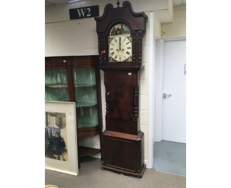 A 19th century Mahogany long case clock with a painted dial eight day going with a painted dial maker Samuel Pearson. Eight d