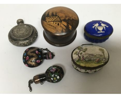 Two 18th century Bilston enamel boxes and a white metal scent bottle and glass scent bottles. Some damage.