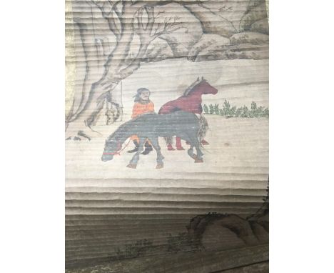 A Chinese scroll depicting a landscape view with figure and horses