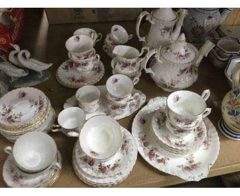 A  Collection royal Albert Lavender rose Including cups saucers milk jug and sugar bowl coffee pot tea pot