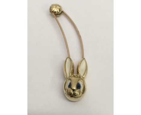 An 18ct gold and enamel Bugs Bunny pin.Approx 7cm long