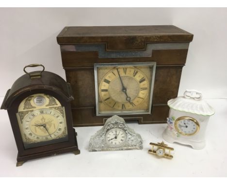 A large Art Deco mantel clock plus other examples