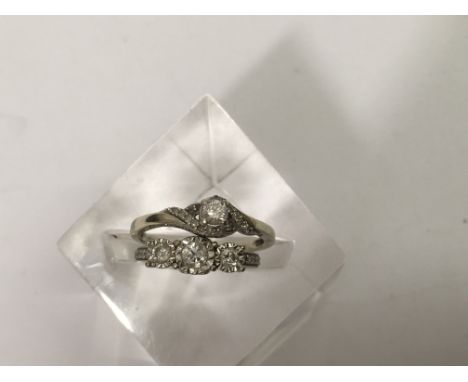Two 9ct white gold, diamond set rings.Approx J and R