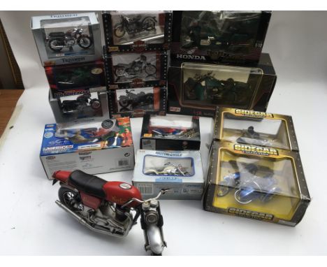 A collection of boxed Motorcycles, some with sidecars, including Harley Davidson, Norton, Honda, etc, different scales rangin