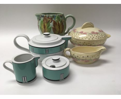 A Clarice Cliff jug tureen and matching gravy boat and a Arzberg tea pot milk jug and sugar bowl