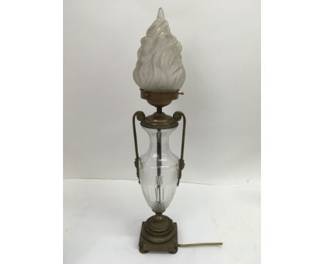 A fine quality glass and brass table lamp in classic style with a flambeau glass shade, approx height 61cm.