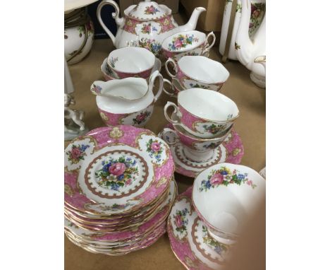 A royal Albert lady Carlyle tea set comprising teapot milk jug sugar bowl milk jug cups and saucers