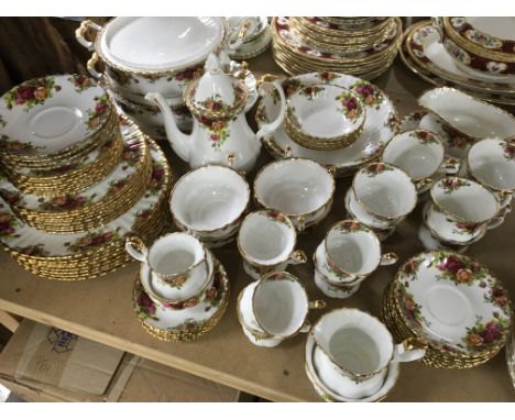 A   collection of royal Albert country rose including cups saucers coffee pot tureen