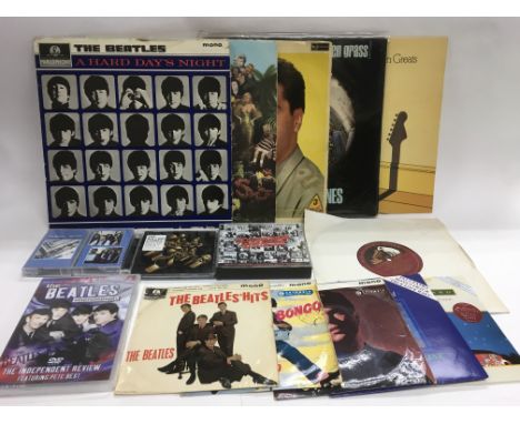 A small collection of LPs, 7inch singles, EPs and cassettes by The Beatles, Rolling Stones and Elvis Presley - NO RESERVE