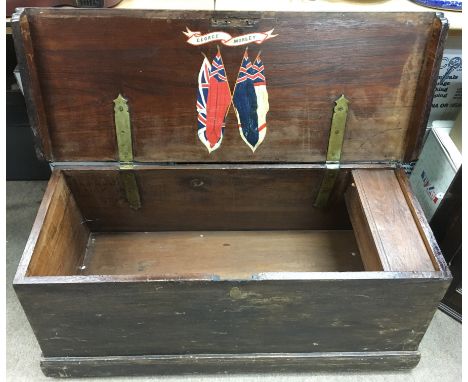 A sailor's wooden travelling trunk, the inside lid painted with flag and name George Morley.Approx 41x107x41cm deep