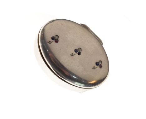 French silver oval patch or pill box decorated to hinged cover with coloured stones, 0.8oz approx   Condition: 