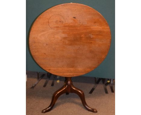 George III mahogany circular snap-top supper table standing on a turned pillar and tripod base   Condition: 