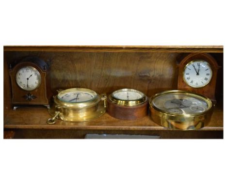 Early 20th Century mahogany cased mantel clock having pewter and hardwood inlay, the dial with Arabic numerals, another mante