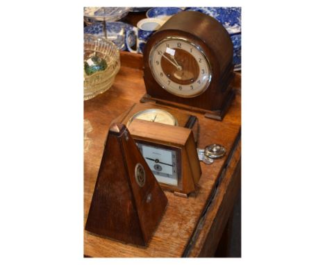 Two mantel clocks, a metronome and a barometer   Condition: 