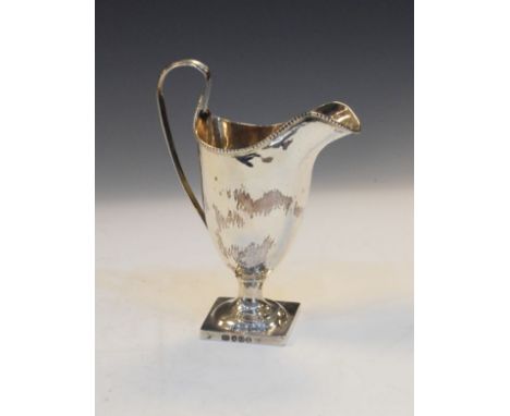 George III cream jug of neo classical helmet form with strap handle, London 1809, 3.7oz approx   Condition: 